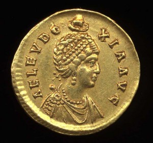 Gold coin showing image of empress Eudoxia. Inscription reads "AEL(IA) EUDOXIA AUG(USTA)